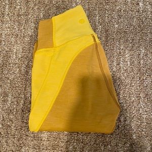 Lululemon running style leggings with two shades of yellow